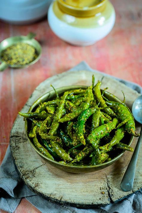 Hari mirch ka achar or green chili pickle goes very well with Indian meals. Here is my mother's recipe to make this pickle. It's beyond words. Choley Recipe, Chilli Pickle Recipe, Mirch Ka Achar, Indian Pickle Recipe, Indian Pickles, Achar Recipe, Green Chilli Pickle, Chilli Pickle, Vegetables Dishes