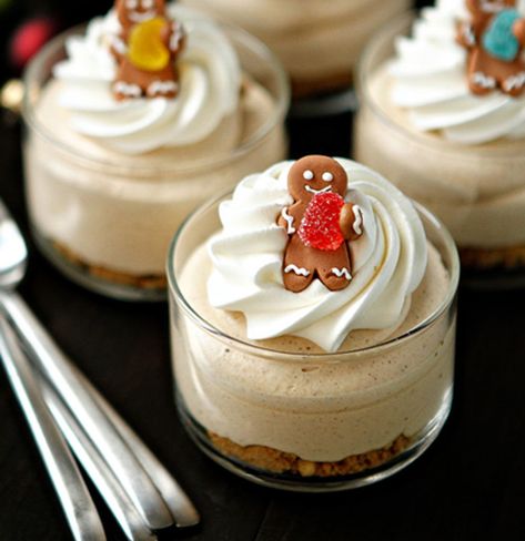 13 Mini Christmas Desserts to Add to Your Wish List | Gingerbread flavor shines in three ways in these creamy, airy no-bake cheesecakes: in the crust, in the gingerbread pudding cream cheese filling, and a miniature gingerbread man on top. A spoonful of pumpkin pie spice further amps up the flavor. Click here for the full dessert recipe. #recipes #recipeideas #realsimple #christmasrecipes #christmaspotluck #christmasfood Individual Christmas Desserts, Light Christmas Dessert, Mini Christmas Desserts, Easy Christmas Desserts, Christmas Desserts Cakes, Gingerbread Dessert, Mini Dessert Recipes, Christmas Cheesecake, Xmas Desserts