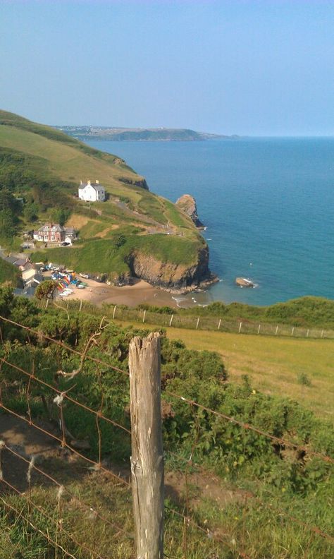 Llangrannog, a small seaside village in Ceredigion, West Wales - many memories of holidays spent here Welsh Village, Ceredigion Wales, Photo Essay Examples, Welsh Coast, West Wales, Seaside Village, Seaside Cottage, Places Of Interest, Photo Essay