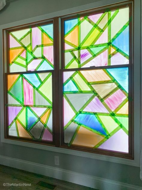 Looking for a fun project for the kids? This faux stained glass window project is a fun way to dress up your windows, and easy to remove using Washable Finger Paint.During quarantine I was looking for a fun way to entertain my kids. I had seen multiple people using this concept on concrete with sidewalk chalk so I gave it a try on our windows using washable finger paint that we had on hand. Tape off your pattern    The first step is to tape off your pattern. I used basic painter's tape… How To Paint Stained Glass Windows, Washable Window Paint Diy, Kids Stained Glass Window Craft, Diy Stained Glass Window Paint, Diy Window Paint Washable, Glass Window Art Diy, Washable Window Paint, Stained Glass Window Painting, Diy Window Paint