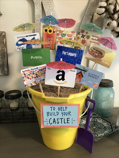 House Warming Ideas. Beach pail gift bucket with gift cards. House Warming Gift Card Ideas, Housewarming Gift Card Ideas, Housewarming Gift Card Basket, Home Decor Raffle Basket Ideas, House Warming Gift Baskets, Beach House Housewarming Gift, Camping Auction Basket Ideas, Pool Gift Basket Ideas, House Warming Party Ideas Themes