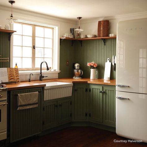 Dark green cabinets