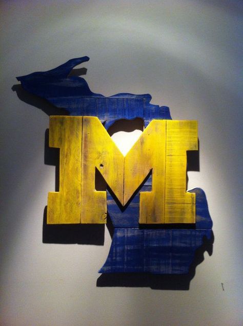 Rivalry Week in Michigan means you are either a Spartan or a Wolverine!  No matter which school you support, the Maize and Blue of UM is a striking color palette! University Of Michigan Logo, U Of M Football, Michigan Crafts, Michigan Logo, Michigan Decor, Michigan Go Blue, Michigan Girl, Maize And Blue, Michigan Art