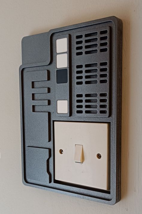 If you are looking for the perfect accessory or gift for a Scifi fan then look no further. This Scifi inspired light switch surround control panel would be a perfect addition to any bedroom, games room, home cinema, man cave or she shed. The panel is made from different thickness's of MDF to create the 3D effect, painted in gun metal with black & white acrylic accent details to really stand out against the metallic base. Star Wars Bedroom Ideas, Star Wars Room Ideas, Scifi Decor, Sci Fi Wall, Star Wars Bedroom, Panel 3d, Star Wars Room, Control Room, Bedroom Games