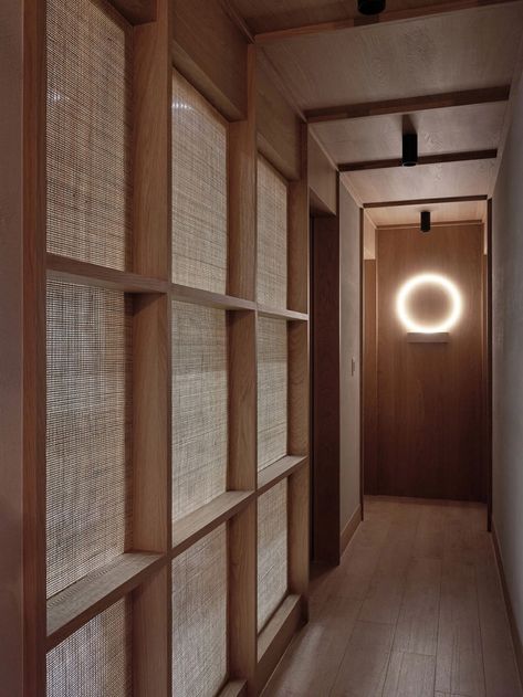 FWS_work designs Residence W as a tranquil retreat in the city Apartment Entrance, Millwork Details, Plywood Walls, Joinery Details, Apartment Renovation, Shelf Lighting, Circular Mirror, Partition Wall, Plaster Walls