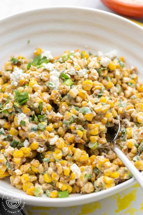 All the flavors of elote come together in this Mexican Street Corn Salad featuring charred corn, fresh veggies, and a flavorful dressing. Taco Side Dishes, Street Corn Salad, Little Sunny Kitchen, Mexican Corn Salad, Appetizer Party, Charred Corn, Leftover Food, Sunny Kitchen, Mexican Street Corn Salad