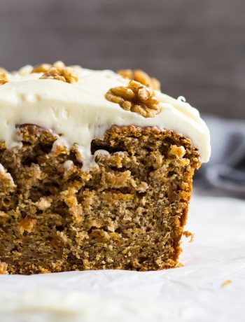 A close-up shot of half a Carrot Cake Loaf topped with a thick layer of cream cheese frosting. Thick Cream Cheese Frosting, Carrot Cake Loaf Recipe, Carrot Cake Loaf, Healthy Carrot Cake, Homemade Carrot Cake, Cake Loaf, Carrot Spice Cake, Moist Carrot Cakes, Spiced Carrots