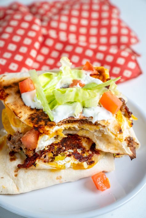 Crunchwrap Quesadilla (Tik Tok Tortilla Hack)?utm_source=12tomatoes Green Snacks, Ground Beef Dishes, Nacho Cheese Sauce, Soft Tacos, Nacho Cheese, Beef Dishes, Mexican Dishes, Shredded Cheese, Main Meals