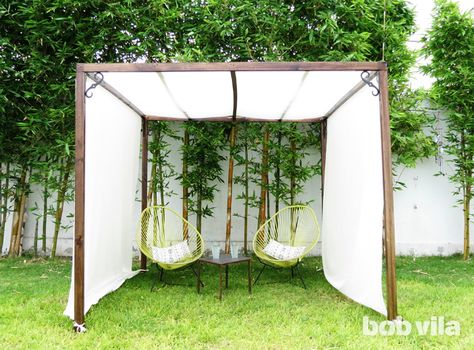 DIY privacy screen and canopy   Define your outdoor space, establish privacy, and even create some extra shade! Diy Patio Ideas, Diy Privacy Screen, Backyard Shade, Backyard Canopy, Cheap Patio, Backyard Gazebo, Backyard Privacy, Patio Shade, Privacy Screen Outdoor