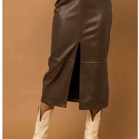 This Stylish Midi-Length Pencil Skirt Features A Rich Dark Brown Color And A Form-Fitting Silhouette That Hugs The Body's Contours. The Prominent Slit On One Side Adds A Fashionable Touch, Making It Perfect For A Night Out Or Cocktail Occasion. Dark Brown Color, Midi Skirt Pencil, Body Contouring, Midi Length, Pencil Skirt, Night Out, Womens Skirt, Color