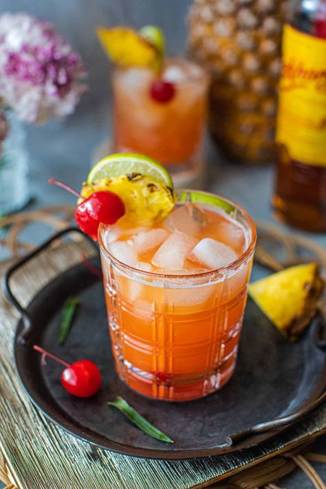 Do you love yourself a good sour cocktail? If so, you must try this Mekhong whiskey sour with pineapple juice. It's a refreshing, sweet, and tangy drink to sip and enjoy on a warm summer day. #mekhongwhiskey #mekhong #mekhong #mekhongrum #mekhongcocktail #whiskeysour #mekhongcocktails Old Fashioned Drink, Kaffir Lime Leaves, Sour Cocktail, Fizzy Drink, Whiskey Sour, Kaffir Lime, Mango Juice, Dark Rum, Cherry Juice