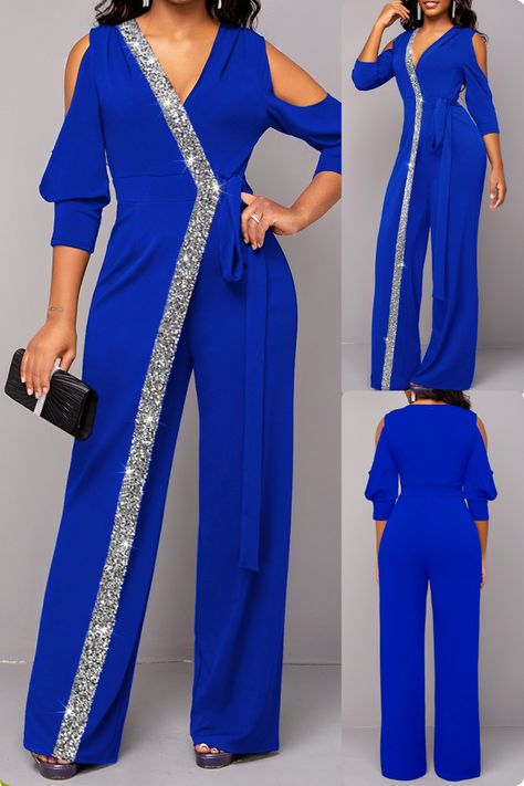 A metal ring royal blue cold shoulder v neck jumpsuit is perfect for any occasion. This jumpsuit features a circular ring, asymmetrical design, and sequin details for a unique and stylish look. With three quarter length sleeves, a v neckline, and a straight leg, this jumpsuit will keep you comfortable while you look your best. Perfect for any occasion from work to a wedding guest or evening event. #jumpsuit #metalring #black #coldshoulder #vneck #sequin #asymmetry #work #weddingguest #elegant Red Wedding Outfit, V Neck Jumpsuit, Wedding Outfit Guest, Glam Outfit, Blue Jumpsuits, Lovely Tops, Red Jumpsuit, White Jumpsuit, Solid & Striped