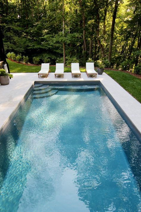 This article will give you an idea of how much it will cost to install a fiberglass pool. #pool #outdoorfurniture #outdoorliving Backyard Pool Area, Fiberglass Pool Cost, Plank And Pillow, Rectangular Swimming Pools, Pool Cost, Rectangle Pool, Dream Backyard Pool, Fiberglass Pool, Pools Backyard Inground