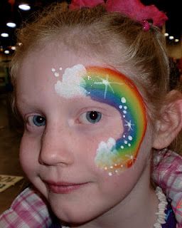 face painting would be fun Easter Face Paint, Rainbow Face Paint, Bodysuit Tattoos, Fair Face, Cheek Art, Girl Face Painting, Rainbow Face, Flower Face, Face Painting Easy