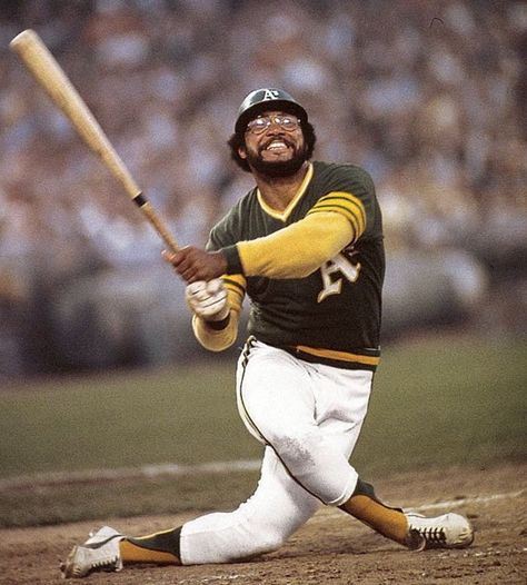 Reggie Jackson in 1975:  His look of pain was the same as his look of joy, which is pretty amazing if you think about it.  In his career, 2,597 strikeouts and 563 home runs. Oakland A’s, Reggie Jackson, Sports Hero, Sports Figures, Sports Pictures, Sports Stars, Sports Photos, Vintage Baseball, Oakland Athletics