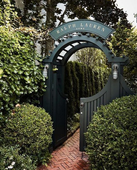 Ralph Lauren Home | A welcoming garden with a decorative brick path leads to our quaint Home Cottage in the heart of Southampton. #RalphLaurenHome | Instagram Ralph Lauren Garden, Arbor Gate, Alameda Central, Garden Gates And Fencing, Garden Gate Design, Side Yard Landscaping, Brick Path, Brick Decor, Home Cottage