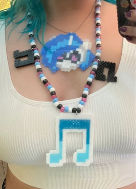 Vinyl scratch kandi perler necklace Emo Perler Beads, Kandi Necklace Ideas, Scene Perler Beads, Emo Kandi, Kandi Necklaces, Scene Items, Perler Bead Necklace, Perler Necklaces, Rave Perler