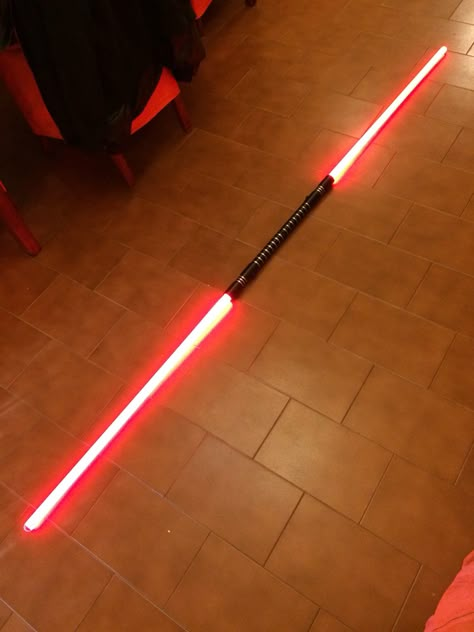 Double Ended Lightsaber, Dual Lightsabers, Double Lightsaber, Female Sith, Sith Apprentice, Spy Kit, Lightsaber Design, Red Lightsaber, Jedi Sith