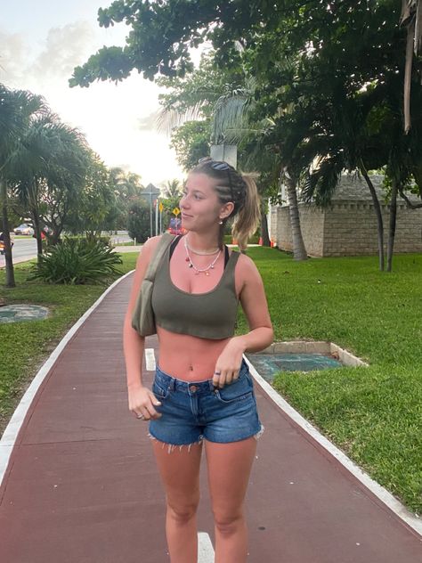 #outfitinspo #greentanktop #greentank #aritziatop #aritzia #aritziabag #greenpurse #greenbag #purse #green #braidedhair #braids #angelnecklace #chainnecklace #chain #jeanshorts #denimshorts #denim #shorts #shortshorts #blacksunglasses #ponytail #shortbrownhair #palmtrees #mexico #mexicovibes Short Brown Hair, Green Purse, Green Tank Top, Green Tank, Green Top, Black Sunglasses, Green Bag, Summer Outfit, Braided Hairstyles