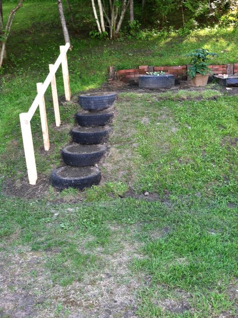 Recycle/up cycle old tires and pallets. Tire Steps Diy, Steps From Old Tires, Pond From Old Tire, Change A Tire, Tire Mountain Playground, Garden Stairs, Used Tires, Old Tires, Urban Farming