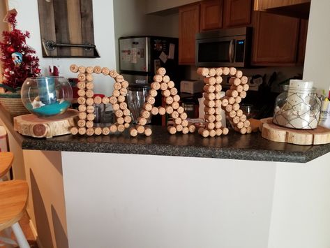 A BAR sign my fiance and I made with letters I cut out. She found a bunch of champagne corks to make this a great piece for our home. Champagne Corks, Wine Corks, Bar Area, Bar Sign, Bar Ideas, A Bar, Bar Signs, Garden Projects, Our Home