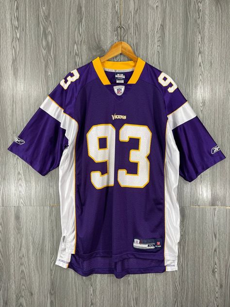 "Authentic vintage Minnesota Vikings NFL jersey from the 1990s. Xlarge size, perfect for any Kevin Williams fan. Show your support for American footba... Nfl Uniforms, Clothing Manufacturing, American Football Shirt, Football Jersey Outfit, American Football Jersey, Rugby Team, Nfl T Shirts, Concept Clothing, Nfl Outfits