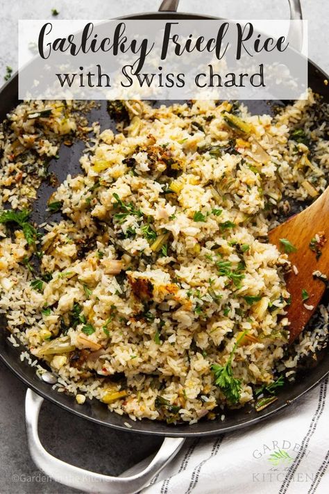 This ​​Garlic Fried Rice with Swiss Chard puts a twist on Filipino garlic fried rice. It’s quick, easy, and packed with crave-worthy crispy garlic and nutrient-rich swiss chard. Store the leftovers for days or weeks at a time so you always have a batch ready for takeout-inspired meals! Filipino Garlic Fried Rice, Garlic Fried Rice, Crispy Garlic, Chard Recipes, Vegan Rice, Rice Side Dishes, The Leftovers, Cooking 101, Garlic Fries