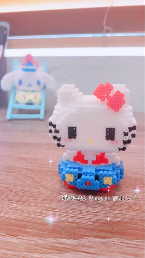 Tutorial to learn how to make 3D hello kitty with perler beads 3d Perler Bead Patterns Hello Kitty, 3d Hello Kitty Perler Beads, Kawaii Diys, Hello Kitty Perler Beads, Hello Kitty Ice Cream, Celebration Video, Hello Kitty 3d, Hama Beads 3d, Hamma Beads Ideas