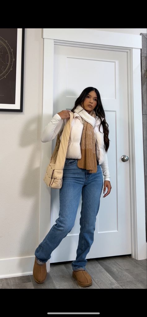 Abercrombie curve love jeans, ugg tasman slippers, scarf, white cropped long sleeve, Sherpa puffer vest, puffer crossbody bag. How to style jeans for fall, petite fashion, casual outfit Long Puffer Vest Outfit, White Puffer Vest Outfit, Petite Fashion Casual, White Vest Outfit, Classy Trendy Outfits, Puffer Vest Outfit, Jeans For Fall, Ootd Jeans, Vest Outfits For Women