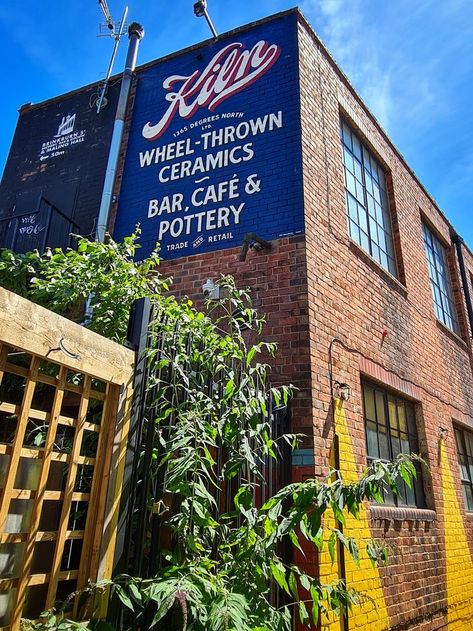 The exterior of Kiln, an all-day cafe, bar and restaurant in Ouseburn, Newcastle. Ouseburn Newcastle, Cafe And Bar, Ceramics Studio, Wheel Thrown Ceramics, Bar And Restaurant, Ceramic Studio, Hand Painted Signs, Cafe Bar, Newcastle