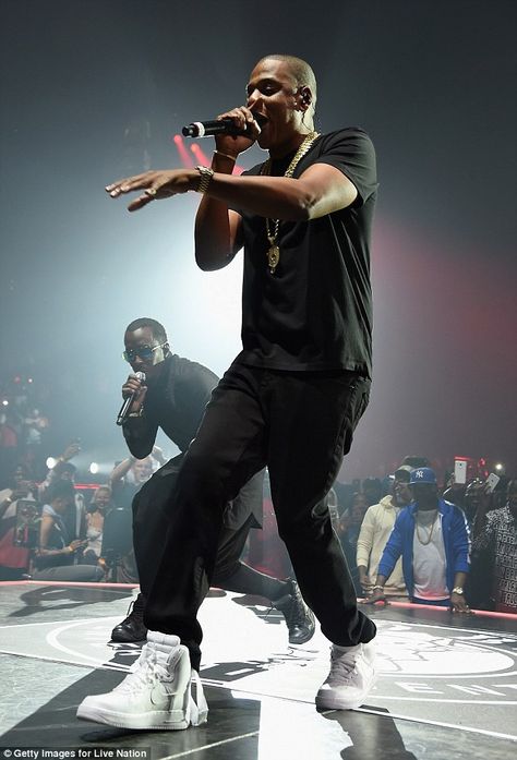 A member of the family: Jay Z was given a very warm welcome by Puff Daddy when he took the stage on Friday at the Barclay's Center in Brooklyn, where the rapper referred to him as his 'brother' Jordan 12 Taxi, Gray Jay, Air Yeezy 2, Sean Diddy Combs, Pusha T, Diddy Combs, Barclays Center, Public Service Announcement, Dj Khaled