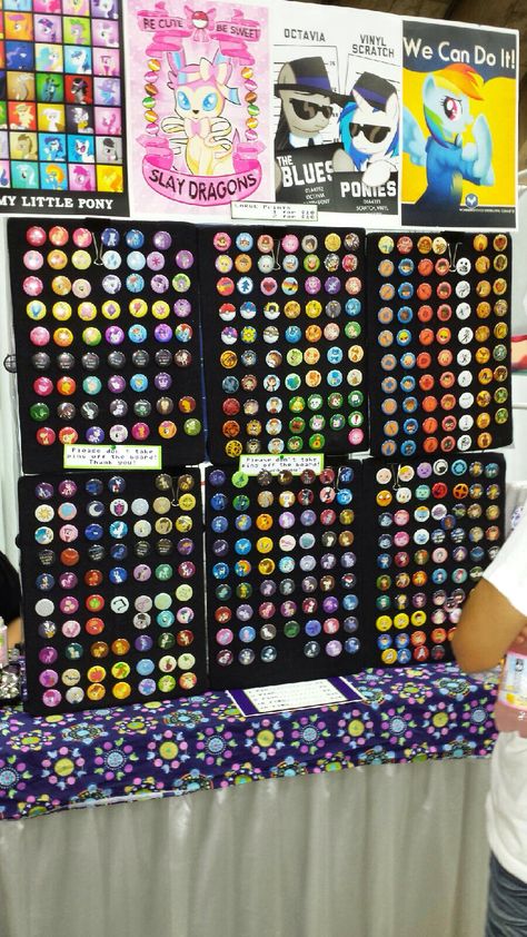 Pinback button display in vendor hall at Bronycon 2014, Baltimore, MD. My Little Pony Convention. I want to do this! Excellent display!! I don't remember the name of the booth, so I can't give credit properly.  But it is an amazing artist and Brony. :-) Craft Show Button Display, Button Display Ideas Pinback, Button Badge Display, Button Display Ideas, Pinback Buttons Display, Collapsible Display, Button Display, Art Fair Booth, Badge Display