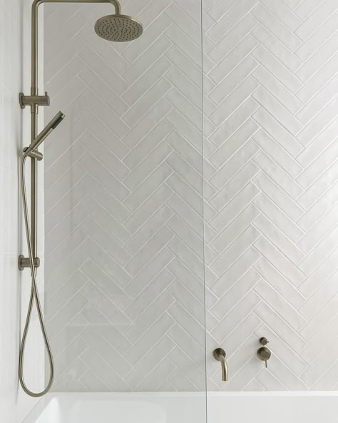 Herringbone subways are such a modern classic. Our Newport matte tiles in 75x300 are the perfect tile to make the pattern. I also love them with the matching colour grout, it doesn’t make the tiles stand out too much. Sooo beautiful ❤️ Subway Tile Patterns Bathroom, White Herringbone Tile Bathroom, Bathroom Herringbone Tile, Vertical Subway Tile Bathroom, Herringbone Bathroom Tile, Colour Grout, Herringbone Bathroom, Herringbone Tile Bathroom, Scandi Bathroom