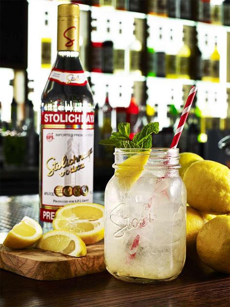 Stolichnaya Premium vodka, the world’s most original vodka, introduces the original serve of the sum-mer, The Stoli Lemonade. A splash of Stoli poured over ice with freshly squeezed lemon juice and... Vodka Stolichnaya, Pray Wallpaper, Stoli Vodka, Squeezed Lemon, Premium Vodka, Tito's Vodka Bottle, How To Squeeze Lemons, Local Food, Tea Bottle