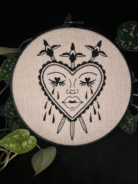 "Embroidered original design, framed in a round hoop.  8\" Hoop Black thread of beige thick textured fabric" Framing Embroidery Projects, Black Embroidery Designs, Alternative Embroidery, Embroidery On Black Fabric, Edgy Embroidery, Witchy Embroidery, Goth Embroidery, Gothic Embroidery, Monochrome Embroidery