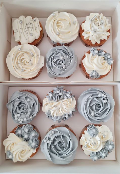 Blue And White Flower Cupcakes, Dusty Blue And Sage Green Wedding Cupcakes, Wedding Cupcakes Ideas Simple Blue, Grey Cupcakes Ideas, 25th Anniversary Cupcakes Ideas, White Cupcake Designs, Something Blue Bridal Shower Cupcakes, 25th Anniversary Cupcakes, Cupcake Arrangements Birthday