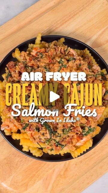 Jared Bobo | Air Fryer Recipes on Instagram: "#ad Let’s make some delicious Air Fryer Creamy Cajun Salmon Fries! I used my favorite @growninidaho #SuperCrispy Crinkle Cut Fries to quickly whip
up the best thing you’ve never had! Recipe below! #airfryerpapi

Pro tip: If you’re using a multi-shelf air fryer, the fries, salmon and creamy Cajun sauce (cooked on the stove) could all be made in under 25 min!
#growninidaho

Creamy Cajun Salmon Fries:
1 pkg Grown In Idaho® Super Crispy Crinkle Cut Fries
2 salmon fillets, skinless
1 tbsp olive oil
2 tbsp Cajun seasoning
1 tbsp lemon pepper seasoning
1 tbsp paprika

Creamy Cajun Sauce:
1/2 cup heavy cream
1/2 cup chicken stock
1/2 cup sun dried tomatoes, chopped
1 cup spinach
1 onion, medium and diced
1 tbsp garlic, minced
1 tbsp Cajun seasoning
1/3 Creamy Cajun Salmon, Creamy Cajun Sauce, Crinkle Cut Fries, Cajun Salmon, Cajun Sauce, Pepper Seasoning, Lemon Pepper Seasoning, Air Fryer Recipes Healthy, Sun Dried Tomatoes