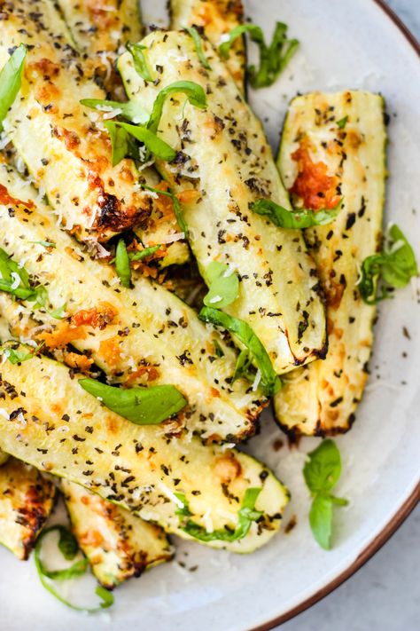 Roasted zucchini with parmesan and basil. A delicious, simple, and healthy vegetable side dish. Uses just 7 ingredients! #zucchini #sidedish #healthy #easyrecipe Zucchini Side Dish Recipes, Walder Wellness, Vegetable Side Dishes Healthy, Zucchini Side Dishes, Zucchini Recipes Healthy, Roasted Zucchini, Easy Vegetable Side Dishes, Roast Zucchini, Healthy Zucchini