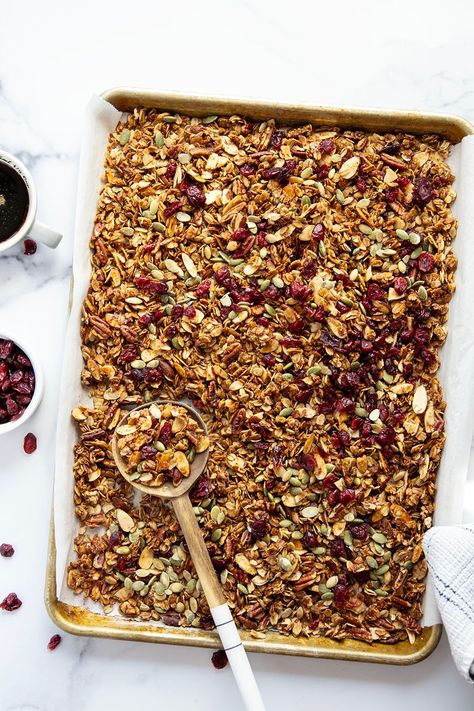 Sweetened entirely with rich maple syrup, this maple granola is perfectly crunchy and loaded with nuts and dried cranberries. Maple Cinnamon Granola, Maple Pecan Granola Recipe, Maple Granola Recipe, Diy Granola, Maple Pecan Granola, Oatmeal Granola, Maple Granola, Cinnamon Granola, Easy Granola