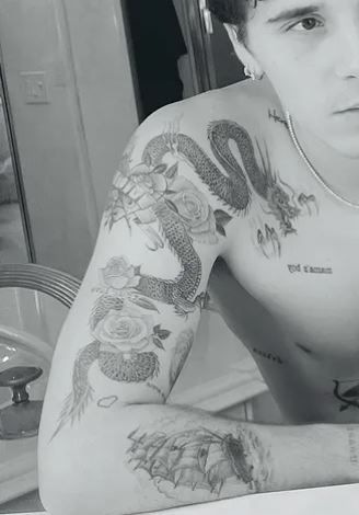 Brooklyn Beckham Tattoo, Wedding Tribute, Photographer Tattoo, Long Dragon, Nicola Peltz, Nicolas Peltz, Brooklyn Beckham, Forever Mine, Large Tattoos