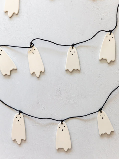 Looking to elevate your Halloween home decor? This Ceramic Ghost Garland is the perfect blend of spooky and charming, ideal for adding a playful touch to your mantel, entryway, or any cozy corner. Embrace the festive spirit with this unique and stylish garland! #HomeDecor #HalloweenDecor #GhostDecor Halloween Anthropologie, Ceramic Garland, Ceramic Ghosts, Pottery Throwing, Simple Halloween Decor, Ghost Garland, Clay Ghost, Modern Halloween Decor, Chic Halloween Decor