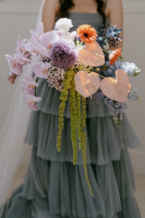 This funky bouquet matches perfectly with the couples colorful ceremony! Air Force Wedding, Unique Bridal Bouquets, Colorful Bridal Bouquet, Fairytale Gown, Unique Bouquet, Colorful Bouquet, Blue Wedding Dresses, Wedding Aisle, Bride Bouquets