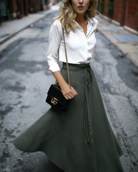 Chic Classic Outfits  // long-sleeve white blouse, olive green wrap skirt, black shoulder bag, nude lip { Gucci, winter style, work outfits, professional style, ootd} Olive Skirt, Staple Tops, Walking Down The Street, Midi Skirt Outfit, Chic Chic, Green Wrap, White Long Sleeve Blouse, Professional Fashion, Nyc Fashion