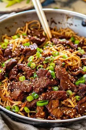 Explore our Mongolian Beef Noodles recipe to create a perfect blend of tender beef, savory sauce, and chewy noodles. Try it today! Shave Beef Steak Recipes, Sticky Beef Noodles, Mongolian Beef And Noodles, Steak Noodles Recipes, Mongolian Beef Recipe Noodles, Steak And Noodle Recipes, Beef Ramen Recipes, Shaved Beef Steak Recipes, Beef Noodles Recipes