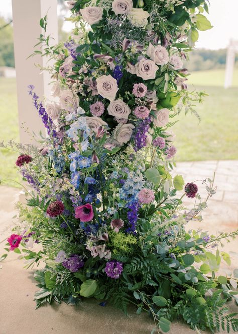 Gorgeous blue and purple ombre wedding ceremony floral pillars for a garden wedding arch Purple Blue Wedding Flowers, Wedding Color Schemes Blue And Purple, Pink Purple Blue Wedding Color Palettes, Purple And Blue Wedding Flowers, Light Blue And Purple Wedding, Purple Garden Wedding, Purple Ombre Wedding, Garden Wedding Arch, Blue And Purple Wedding