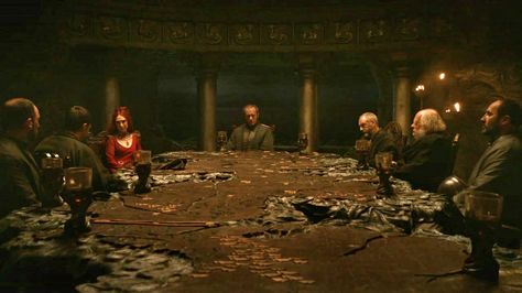 The Chamber of the Painted Table is the main hall in the castle of Dragonstone. It is named after the table that dominates the room, carved in the shape of Westeros and engraved with its major cities and landmarks. The chamber is accessed through a passageway located just behind the right hand of Dragonstone's throne. The chamber is where Stannis Baratheon holds meetings with his court, including Maester Cressen and the Red Priestess Melisandre. After receiving Eddard Stark's message.... Sir Arthur Dayne, Game Of Thrones Halloween, Red Priestess, Ramsey Bolton, Stannis Baratheon, Eddard Stark, Jorah Mormont, Celebrity Quizzes, We Are Teachers