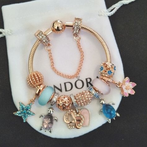 Pandora Bracelet with Pink and Blue Themed Charms Pretty Pandora Bracelet, Pink Themed Pandora Bracelet, Blue And Gold Pandora Bracelet, Good Pandora Bracelet, Colourful Pandora Bracelet, Pandora Bracelet Theme, Pandora Bracelet Pink And Blue, Pandora Charm Bracelet Pink, Pandora Summer Bracelet