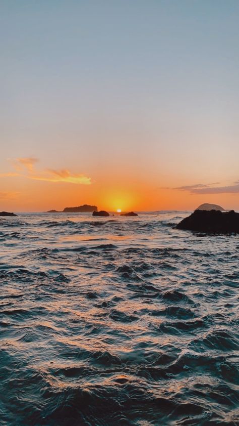 Sunset at Maori Bay in Auckland, New Zealand New Zealand Sunset, Sunset Over The Ocean, Auckland New Zealand, Beach Sunset, Auckland, The Ocean, Phone Wallpaper, New Zealand, Iphone Wallpaper