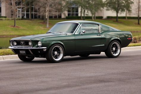 This is a 1968 Mustang GT 2+2 Fastback in Highland Green Metallic. It has Black Nappa leather interior. This car has 17x9.5 Torq Thrust wheels. It features a 460hp Ford 5.0L Ti-VCT Coyote DOHC V8 engine and a Tremec T-56XL 6-speed manual transmission. #mustang #shelby #classicmustang #classicshelby #carinspiration #green #greencar #classiccar 80s Mustang, 1960 Mustang, 60s Mustang, 1968 Mustang Gt, Green Mustang, Mustang 1968, 80s Aesthetic Wallpaper, 65 Mustang, 1968 Mustang