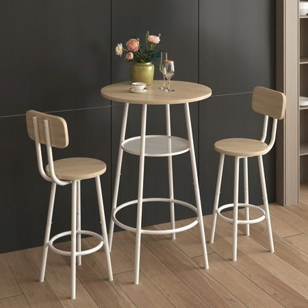 Are you looking for a modern yet stylish counter height dining set? Try our sturdy metal frame dining bar table with seat stools. This lovely dining table set will be a welcome addition to your casual contemporary home. Place this dining table in your casual dining or entertaining space for an instant style update, creating a comfortable place for friends and family to gather. SPECIFICATIONS: Product Type: Bar table set of 3 Color: Rustic Brown/Wood/Beige Material: MDF + Iron Table Dimensions: 2 Tall Dining Table, Small Kitchen Table Sets, Modern Bar Table, Bar Table Set, Round Bar Table, Bar Dining Table, Small Kitchen Tables, Bar Table And Stools, Pub Table Sets